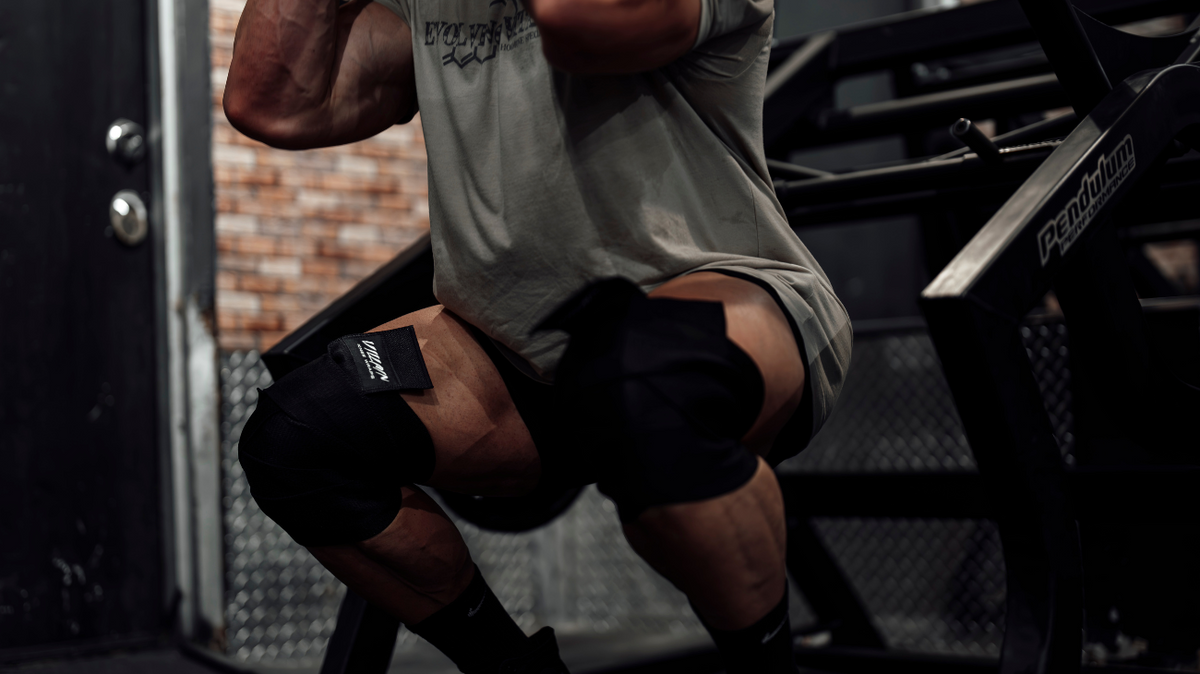 man with tight knee sleeves